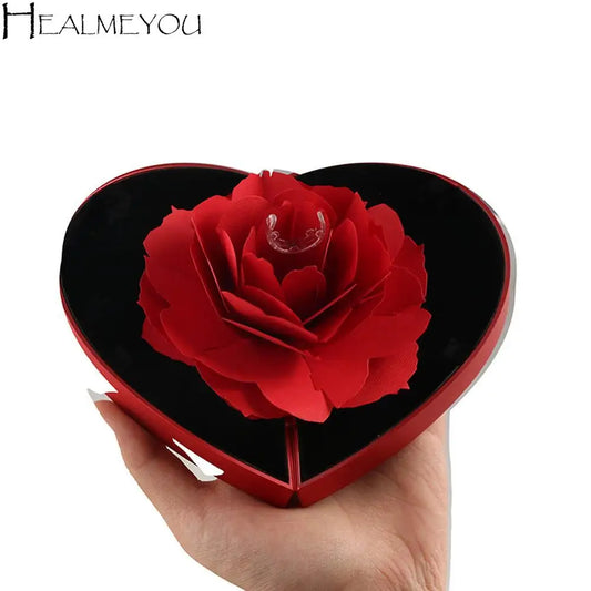 Caja de corazon con rosa 3D con un anillo de regalo