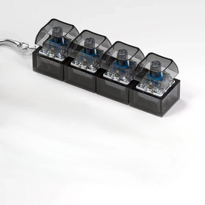 Llavero con teclado LED, juguete antiestrés para adultos